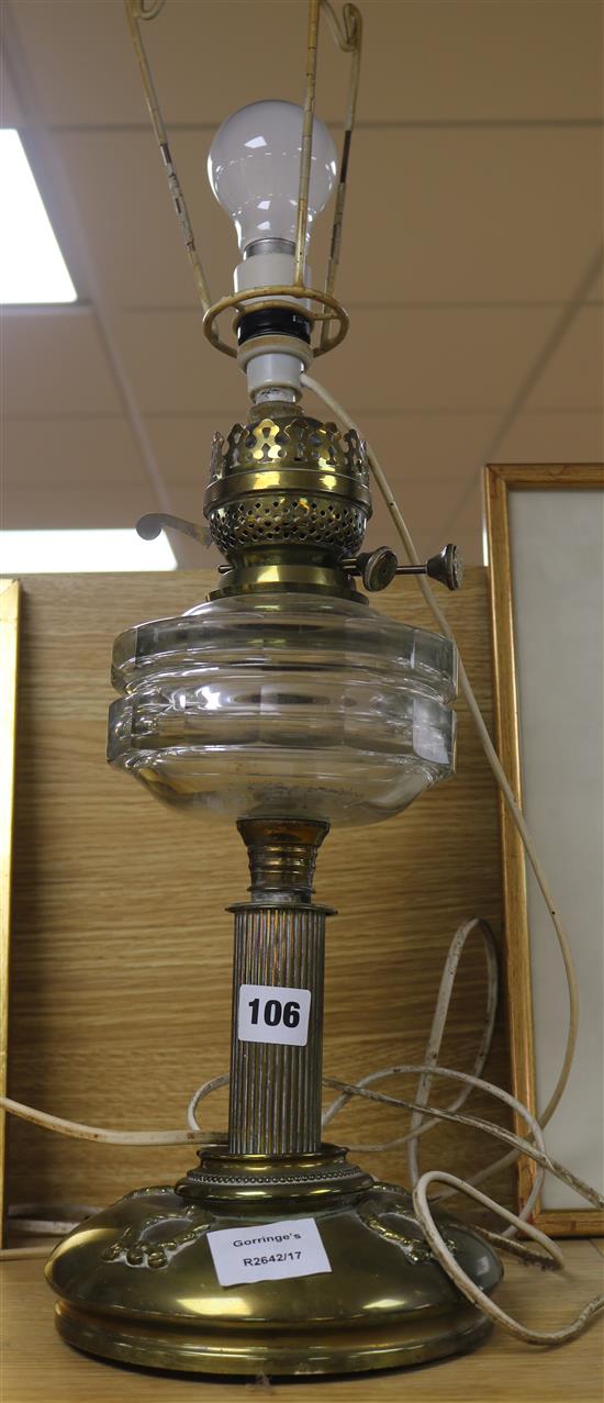 A Victorian brass and glass oil lamp